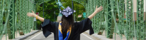 Scholar with "The Best Is yet to Come" on graduation cap